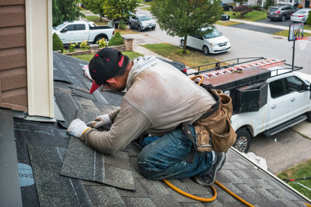 Professional Roofing technician working in Milroy, PA